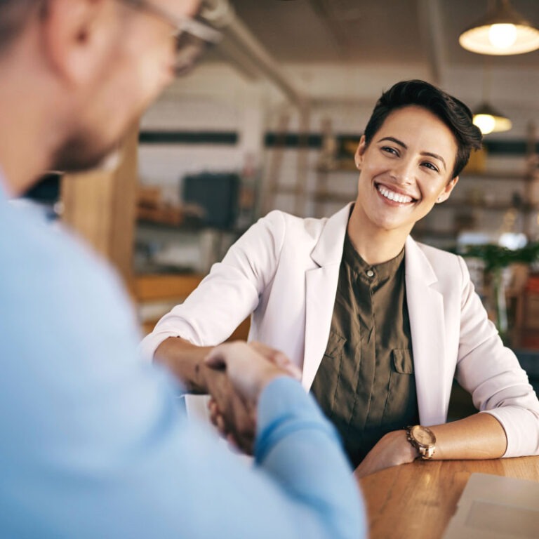 Business deal happening between male and female worker.