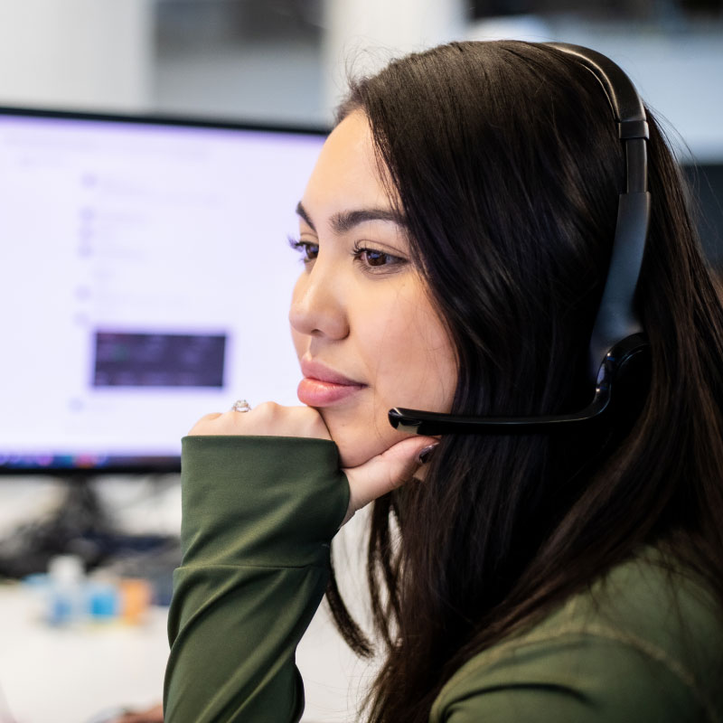 An Echo employee working at her desk.