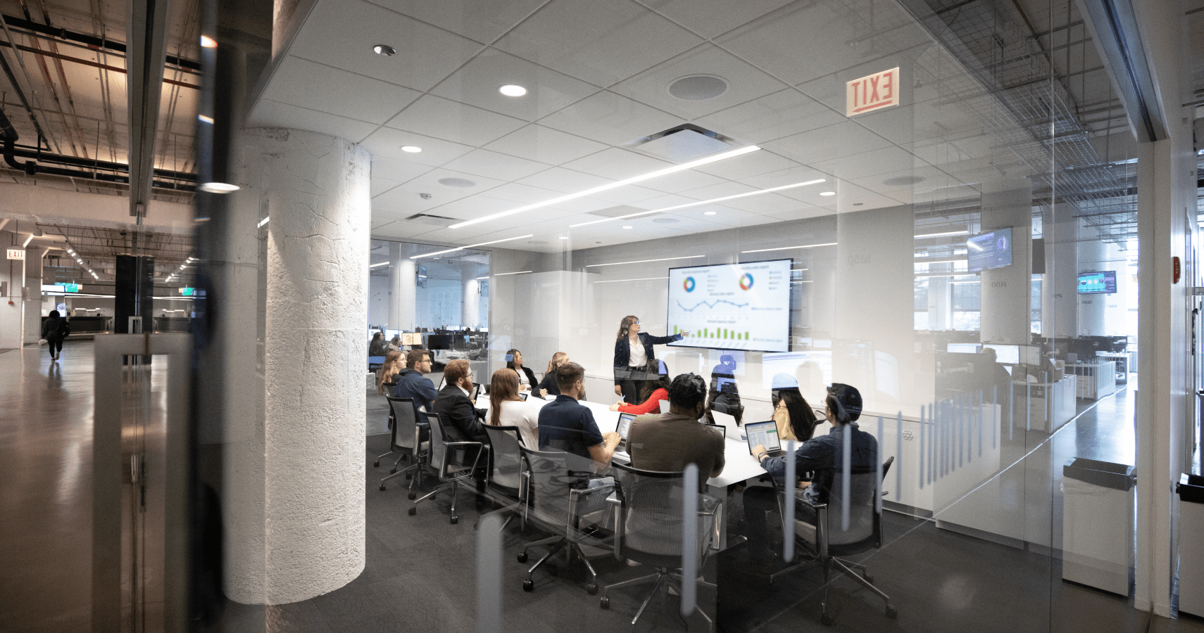 Echo's Managed Transportation team working in a conference room.